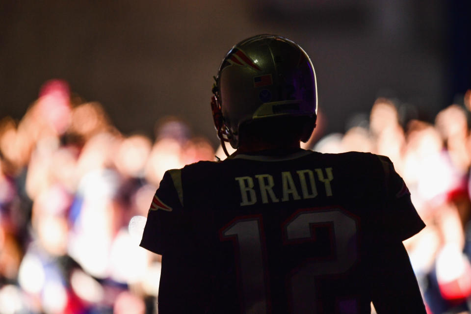 FOXBORO, MA - NOVEMBER 26:  Tom Brady #12 of the New England Patriots exits the tunnel before a game against the Miami Dolphins at Gillette Stadium on November 26, 2017 in Foxboro, Massachusetts.  (Photo by Billie Weiss/Getty Images)