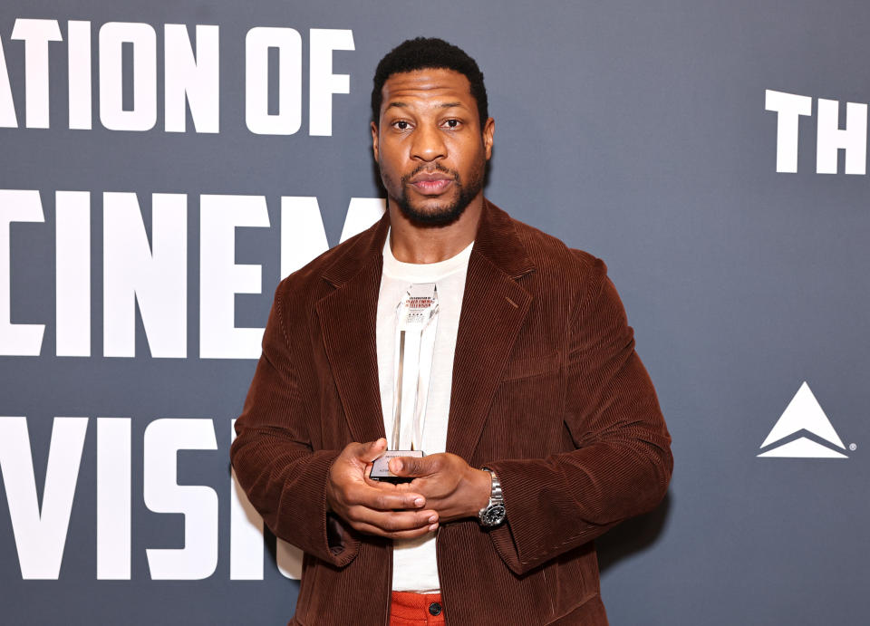 Honoree Jonathan Majors poses with the “Actor Award for Film” in the press room during Critics Choice Association’s 5th Annual Celebration Of Black Cinema & Television at Fairmont Century Plaza on December 05, 2022 in Los Angeles, California.