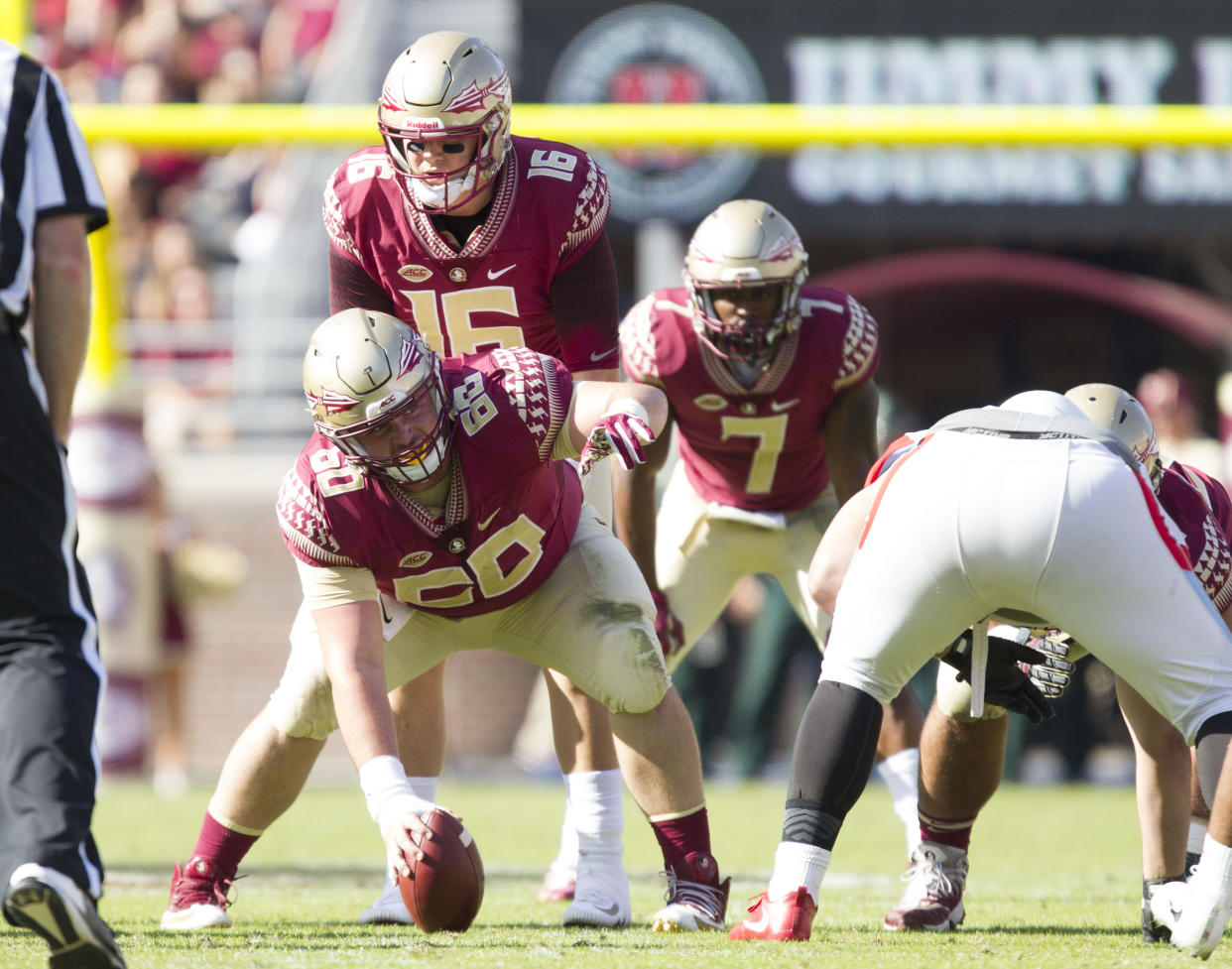 TALLAHASSEE, FL - NOVEMBER 18: Florida State Seminoles offensive lineman Andrew Boselli (60) calls out protection with Florida State Seminoles quarterback J.J. Cosentino (16) and Florida State Seminoles running back Ryan Green (7) during the game between the Delaware State Hornets and the Florida State Seminoles at Doak Campbell Stadium in Tallahassee, FL on November 18th, 2017. (Photo by Logan Stanford/Icon Sportswire via Getty Images)