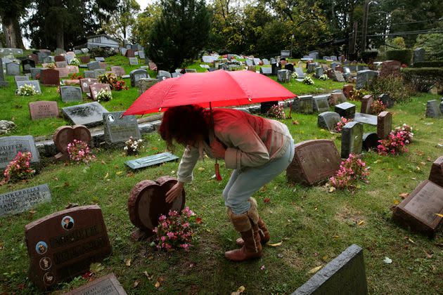 Rhona Levy visits Hartsdale Pet Cemetery on Nov. 1, 2014. She has four pets buried there, including three cats and one dog, and she plans to be buried with them when she dies. (Photo: Carolyn Cole/Los Angeles Times via Getty Images)