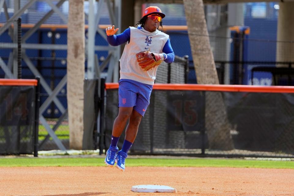 New York Mets infielder Luisangel Acuna takes up his position during a spring training baseball workout Saturday, Feb. 17, 2024, in Port St. Lucie, Fla.