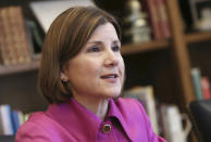 FILE - In this March 12, 2018, file photo, Minnesota Attorney General Lori Swanson speaks during an interview at the Capitol in St. Paul. Minnesota voters are confronting their busiest primary election in recent memory, with races for governor, both Senate seats and three congressional seats all on the ballot. The biggest unsettled question may be the Democratic primary to succeed Gov. Mark Dayton. U.S. Rep. Tim Walz, Attorney General Lori Swanson and state Rep. Erin Murphy all have a path to victory entering Minnesota's primary on Tuesday, Aug. 14, 2018. (AP Photo/Jim Mone, File)