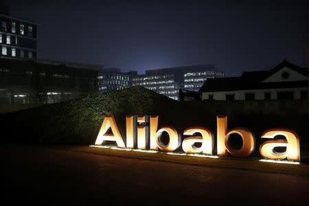 The logo of Alibaba Group is seen inside the company's headquarters in Hangzhou, Zhejiang province in this November 11, 2014 file photo. REUTERS/Aly Song