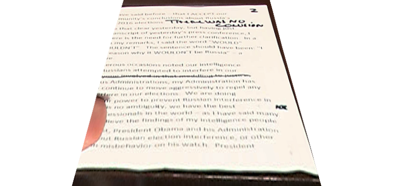 A close-up&nbsp;of Trump&rsquo;s &ldquo;There was no colusion&rdquo;&nbsp;note. (Photo: Getty)