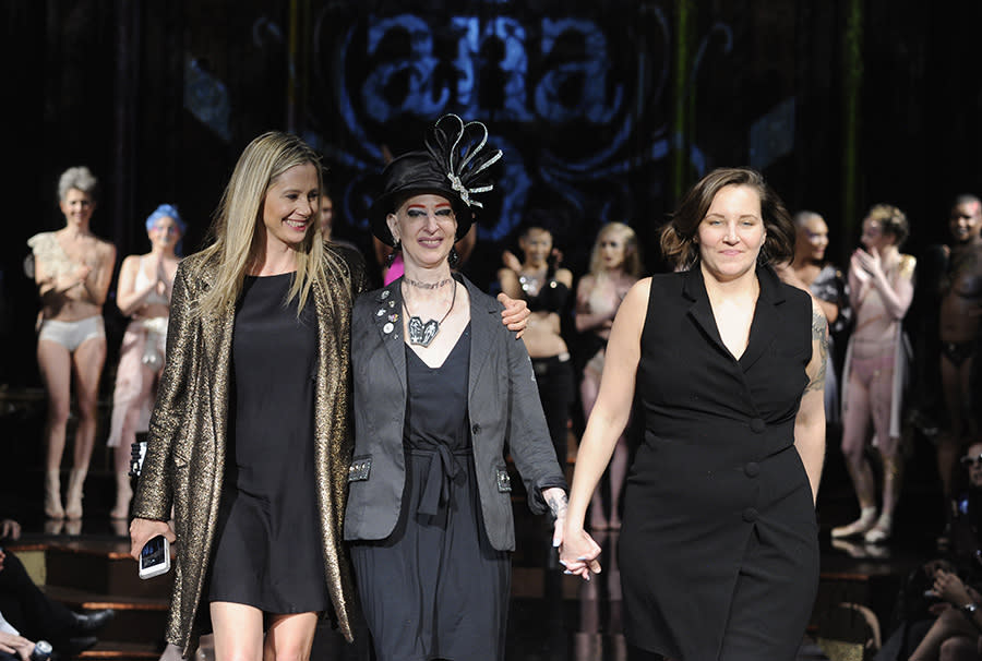 Mira Sorvino, Champagne Joy, and AnaOno founder Dana Donofree walk the runway at the end of the show