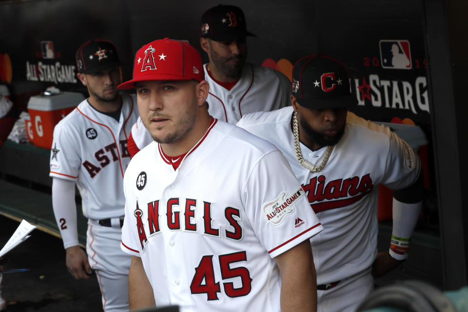 American League Mike Trout, of the Los Angeles Angels, waits to be introduced while wearing the number 45 of Los Angeles Angels pitcher Tyler Skaggs, who passed away last Monday, before the start of the MLB baseball All-Star Game, Tuesday, July 9, 2019, in Cleveland. (AP Photo/John Minchillo)