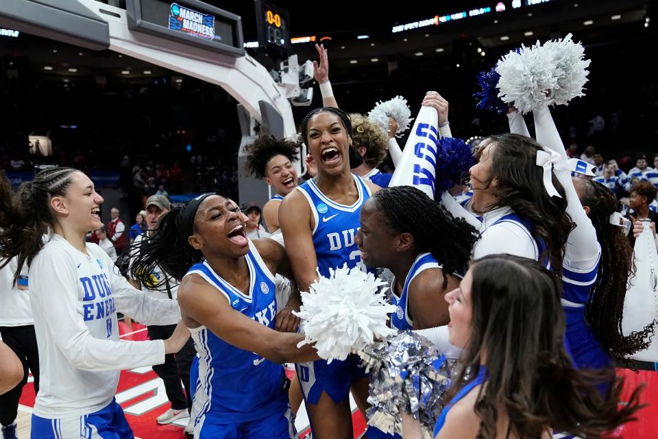 Duke players celebrate their win over Ohio State on Sunday.