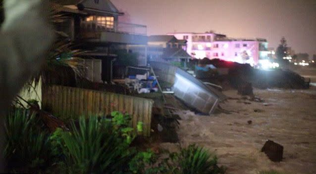 Ms Silk was evacuated at 7:30pm the night before, saying she still had close to 25 metres of garden between her house and the ocean. Photo: 7 News