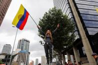 Demonstrators take part in a protest as a national strike continues in Bogota