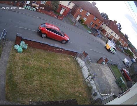 Screenshot taken from CCTV dated 22/05/23 of a police van appearing to bounce over a speed bump on Howell Road as it was following two teenagers on a bike in Ely, Cardiff, minutes before they crashed and died (PA)