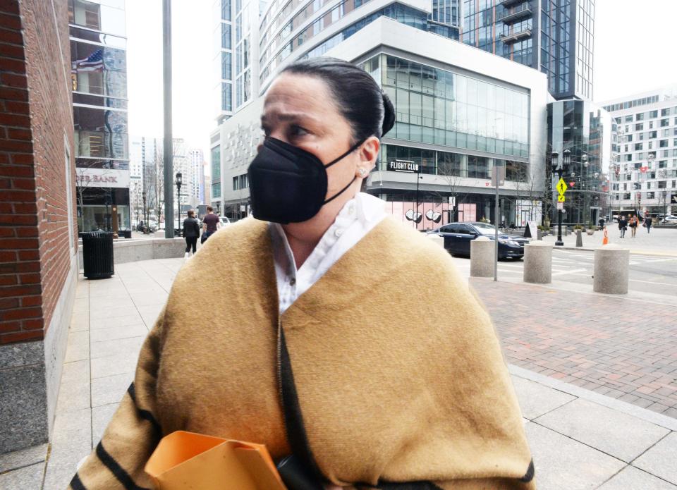 Genoveva Andrade enters John Joseph Moakley Courthouse in Boston for sentencing on Monday, March 7, 2022.  