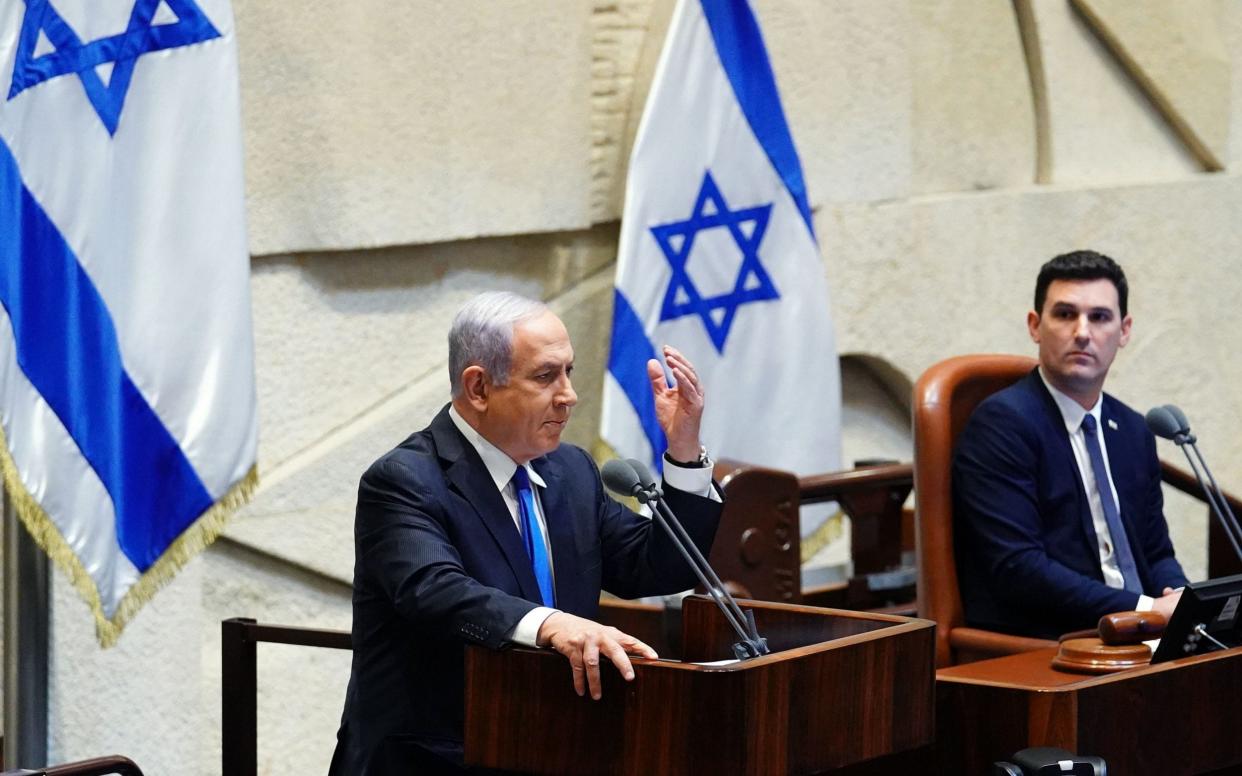 Benjamin Netanyahu has clung on to power after a year of turmoil - KNESSET SPOKESPERSON OFFICE/AFP via Getty Images