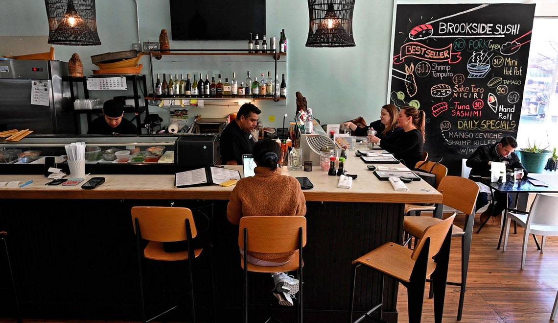 Customers gather for lunch at Brookside Sushi.