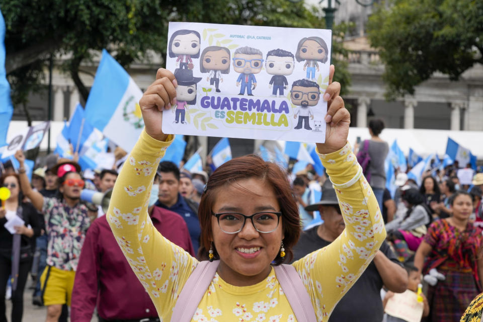 A woman shows support for the Seed Movement party during a march against legal actions taken by the Attorney General's office against President-Elect Bernardo Arévalo, at the Constitutional Square in Guatemala City, Saturday, Sept. 2, 2023. Guatemala's Congress has declared the Seed Movement's seven lawmakers — one of whom is Arévalo — independents, which bars them from holding leadership positions. (AP Photo/Moises Castillo)