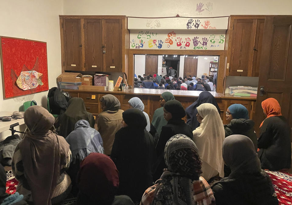 Muslim students gather for a Friday prayer led by Jaylani Hussein, executive director of the Council of American-Islamic Relations' Minnesota chapter, inside Grace University Lutheran Church near the University of Minnesota's campus in Minneapolis, Oct. 13, 2023. In Muslim communities across the world, worshippers gathered for their first Friday prayers since Hamas militants attacked Israel, igniting the latest Israel-Palestinian war. (AP Photo/Trisha Ahmed)