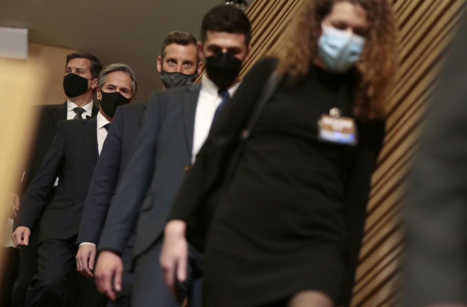 U.S. Secretary of State Antony Blinken, second left, arrives for a media conference after a meeting of NATO foreign ministers at NATO headquarters in Brussels on Wednesday, March 24, 2021. (AP Photo/Virginia Mayo, Pool)