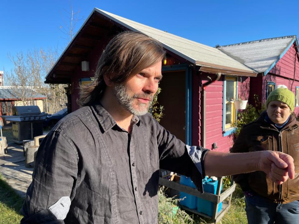 Eric DeLong has lived in a purple house in downtown Whitehorse for the last four years approximately. Now, he's fighting for the lease for the land the home sits on to be renewed, after the Yukon government recently said it has expired.