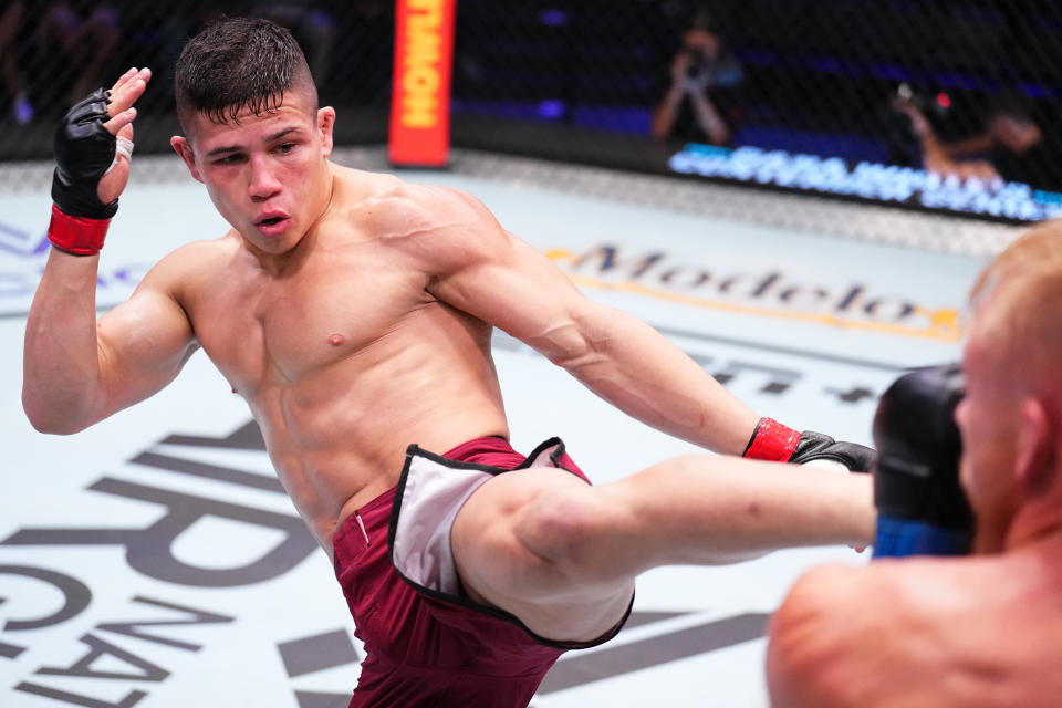 LAS VEGAS, NEVADA – SEPTEMBER 12: (L-R) Jean Matsumoto of Brazil kicks Kasey Tanner in a bantamweight fight during Dana White’s Contender Series season seven, week six at UFC APEX on September 12, 2023 in Las Vegas, Nevada. (Photo by Chris Unger/Zuffa LLC via Getty Images)