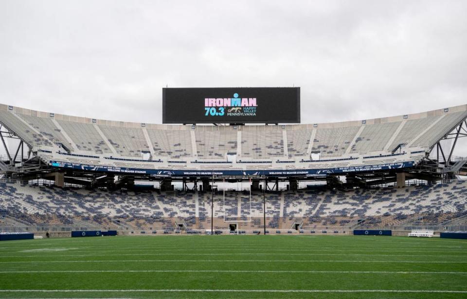 The scoreboard at Beaver Stadium promotes the Ironman 70.3 Happy Valley Pennsylvania Triathlon, which will finish in the stadium in July 2023.