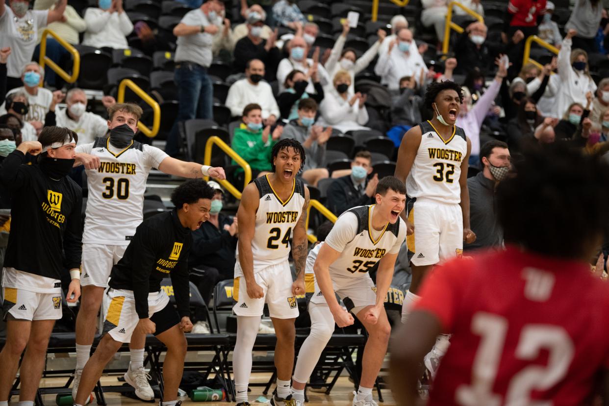 The College of Wooster celebrates in the closing seconds of its win over Wittenberg.