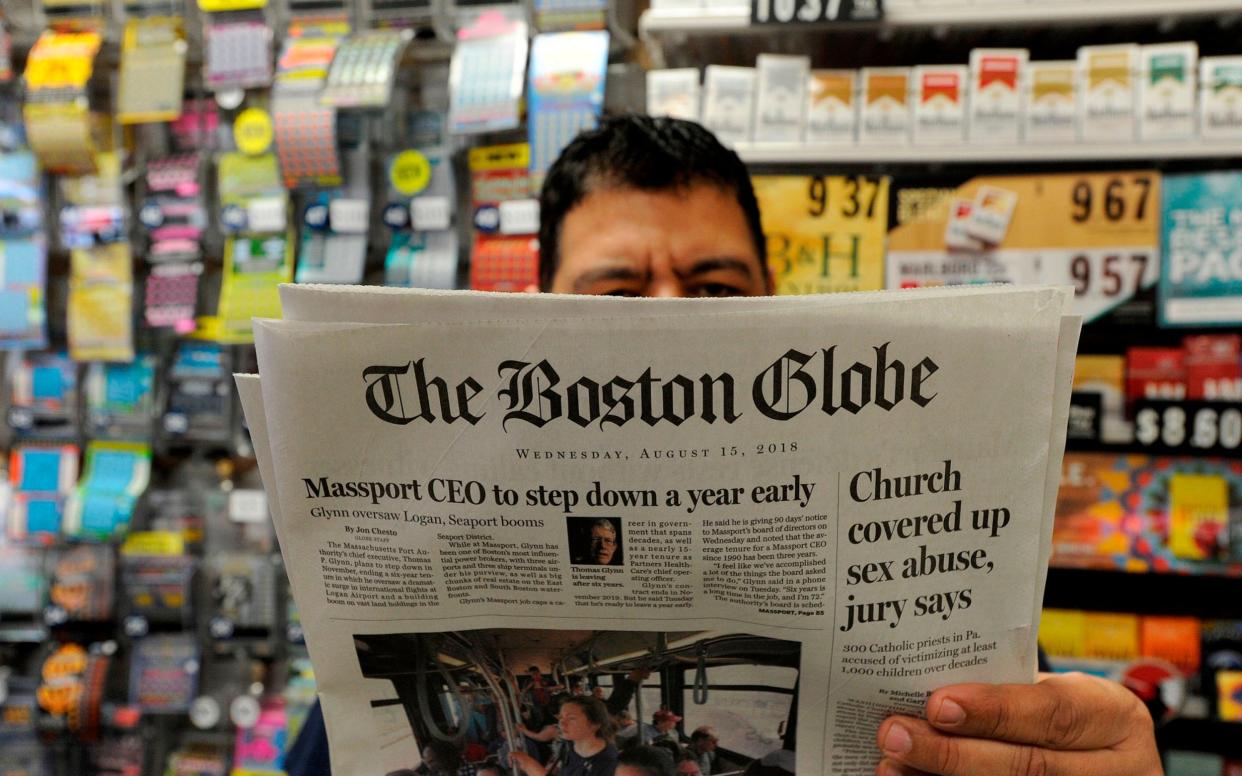 The Boston Globe was among 300 newspapers to publish warnings about Trumps attacks on the press - AFP