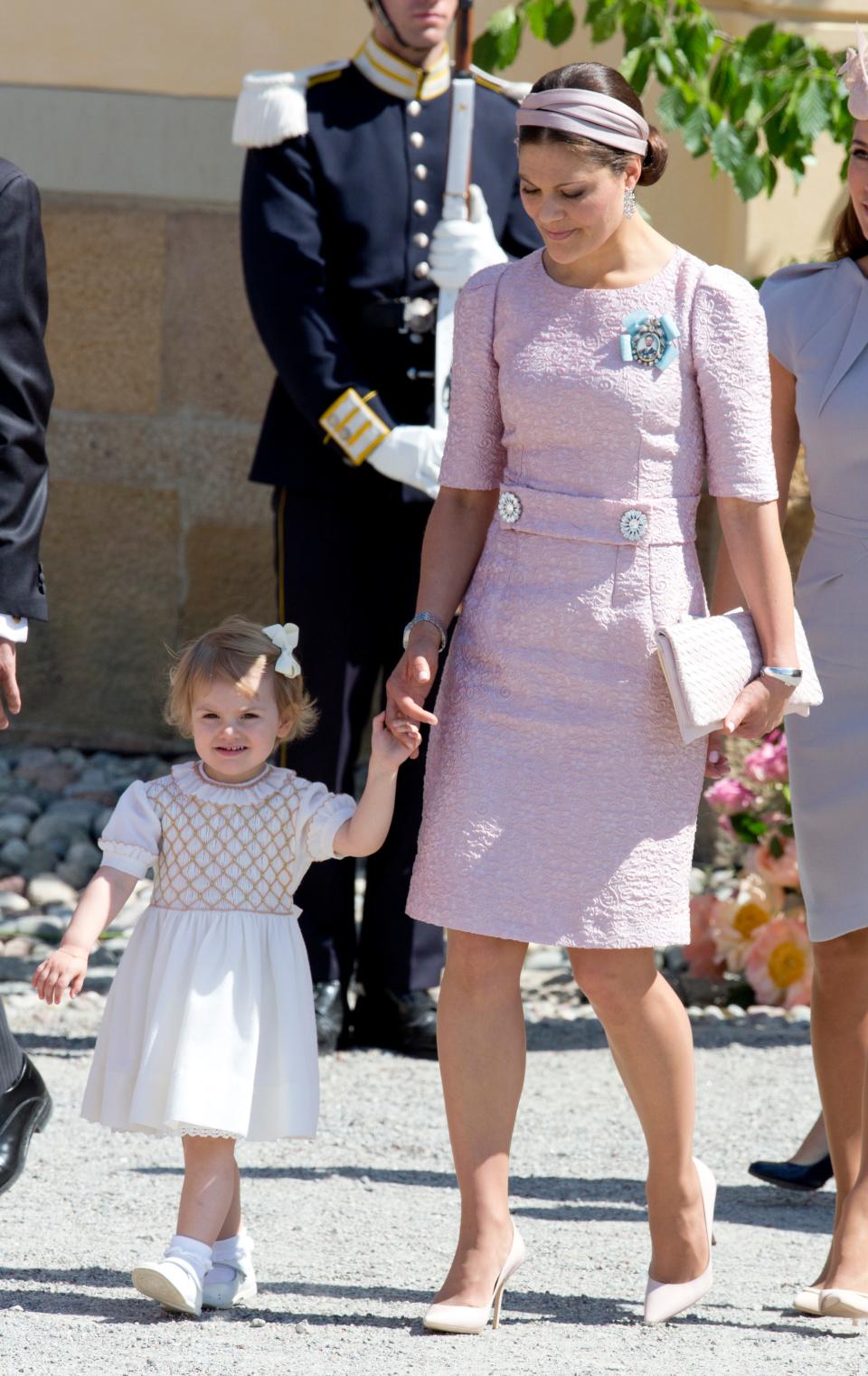 Crown Princess Victoria of Sweden wears a pink dress