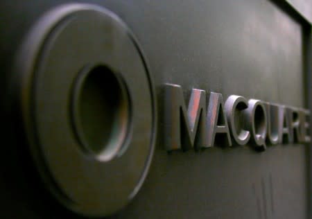 FILE PHOTO: The logo of Australia's biggest investment bank Macquarie Group Ltd adorns the main entrance to their Sydney office headquarters in Australia