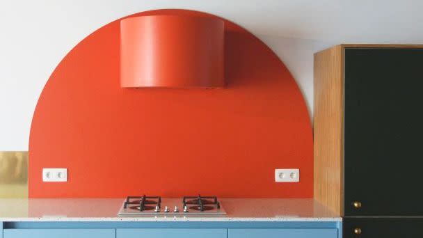 orange and baby blue kitchen