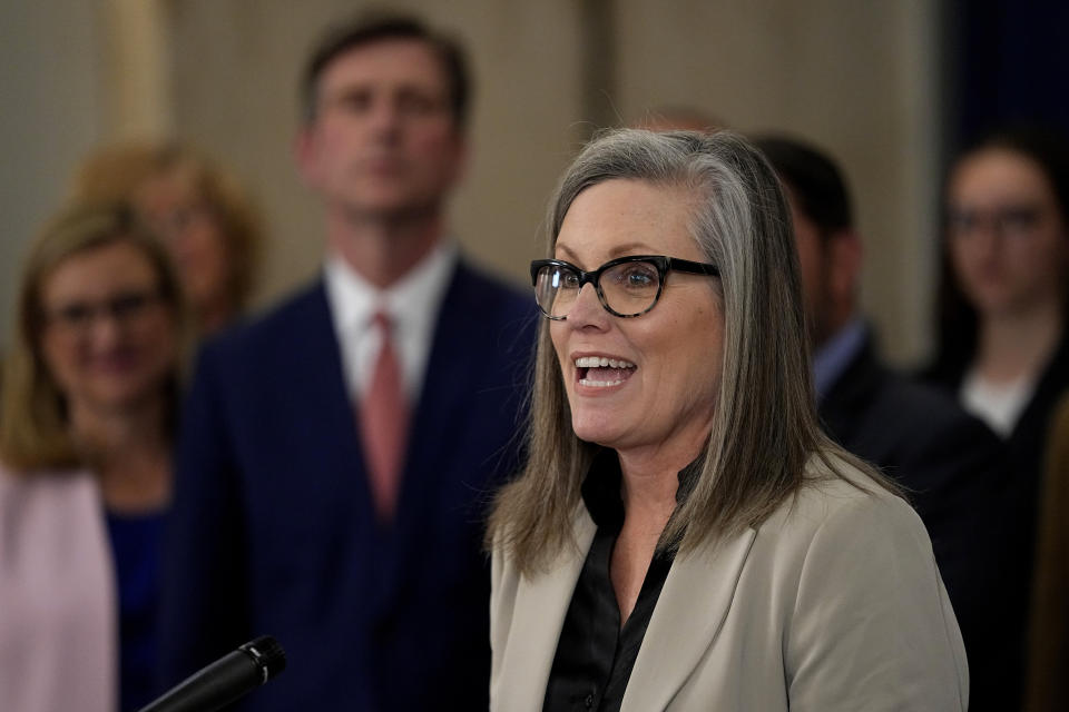 Arizona Gov. Katie Hobbs, D, speaks at the Capitol, Thursday, April 6, 2023, in Phoenix. Hobbs was discussing newly announced water conservation funding for Gila River Indian Community and water users across the Colorado River Basin aimed to protect the stability and sustainability of the Colorado River System. (AP Photo/Matt York)