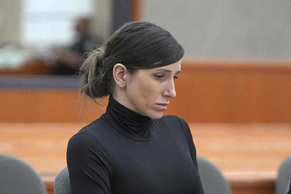 Kouri Richins, a Utah mother of three, who wrote a children's book about coping with grief after her husband's death and was later accused of fatally poisoning him, looks on during a hearing Wednesday, May 15, 2024, in Park City, Utah. (AP Photo/Rick Bowmer, Pool)