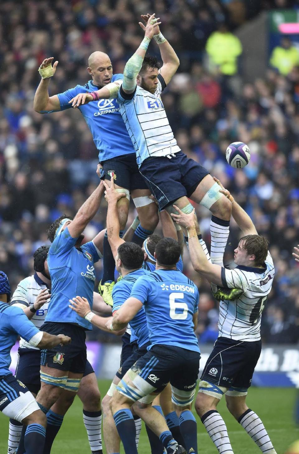 Scotland's Ryan Wilson steals the ball at a line out from Italy's Sergio Parisse during their Six Nations match at Murrayfield in Edinburgh, Scotland, Saturday March 18, 2017. (Ian Rutherford/ PA via AP)