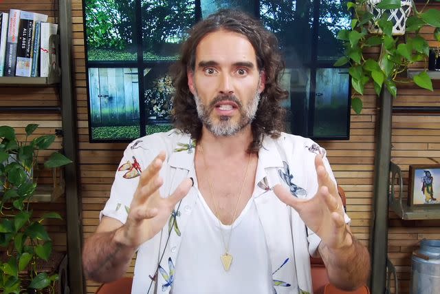 <p>Russell Brand/YouTube</p> Russell Brand posts video to social media