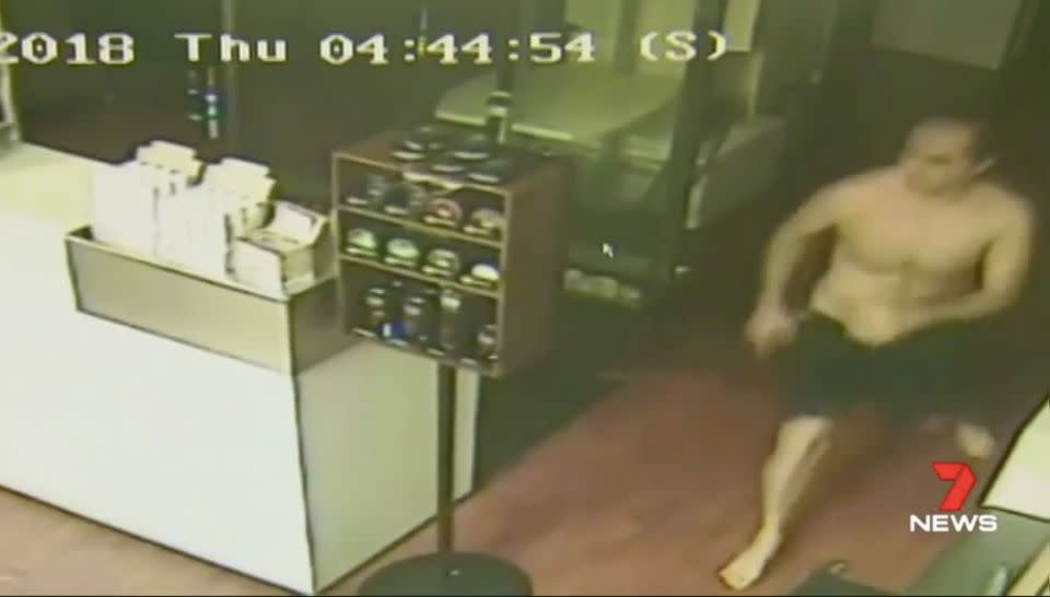 Salon owner Sean Nevo appears from upstairs to confront the burglars. Source: 7 News