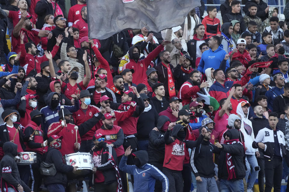 Fans cheer their team during the FIFA Club World Cup soccer match between Seattle Sounders FC and Al Ahly FC at the Tangier stadium, in Tangier, Morocco, Saturday, Feb. 4, 2023. (AP Photo/Mosa'ab Elshamy)