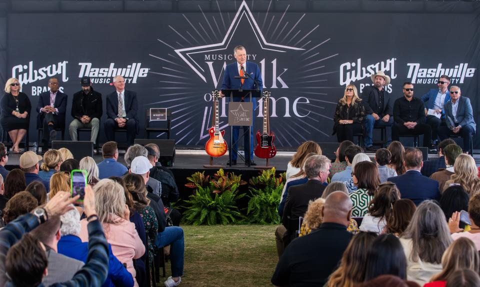 Bill Cody addresses the crowd at Walk of Fame Park during the Music City Walk of Fame induction ceremony on May 4, 2023