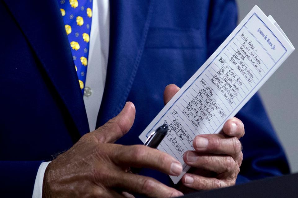 The notes of Democratic presidential candidate former Vice President Joe Biden reference Sen. Kamala Harris, D-Calif., among other things as he speaks at a campaign event in Wilmington, Delaware, on Tuesday, July 28, 2020. (AP Photo/Andrew Harnik)