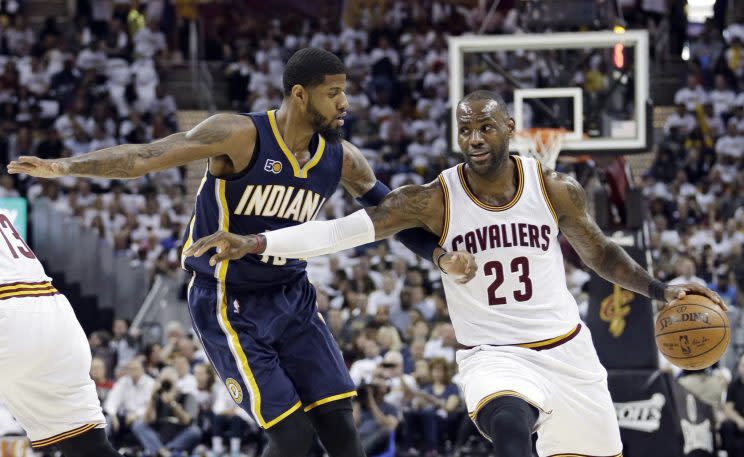 All that stopped Paul George from teaming with LeBron James, apparently, was one text message. (AP)