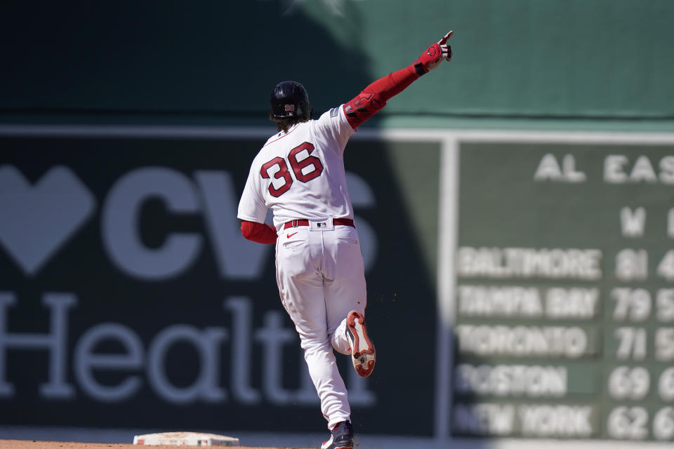 Boston Red Sox's Triston Casas celebrates as he runs the bases after hitting a two-run home run in the sixth inning of a baseball game against the Los Angeles Dodgers, Sunday, Aug. 27, 2023, in Boston. (AP Photo/Steven Senne)