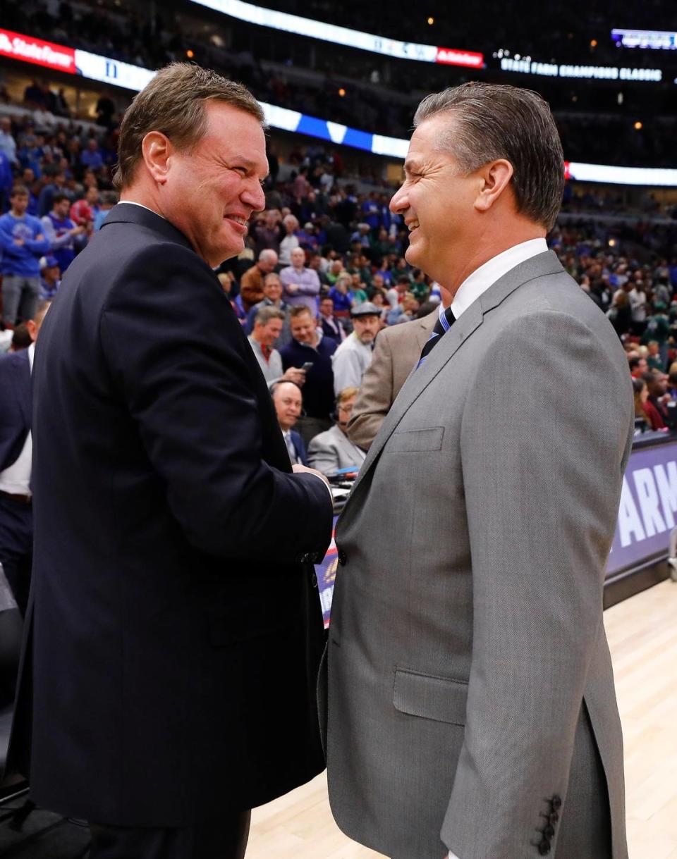 Kansas head coach Bill Self and Kentucky head coach John Calipari shake hands before the State Farm Champions Classic at the United Center in Chicago in 2017. Kansas beat Kentucky 65-61.