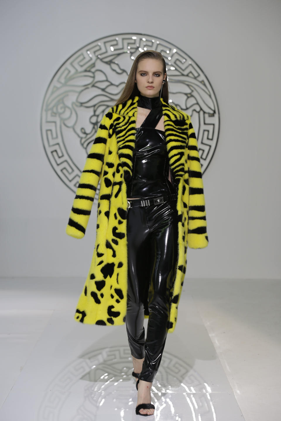 A model wears a creation for Versace women's Fall-Winter 2013-14 collection, part of the Milan Fashion Week, unveiled in Milan, Italy, Friday, Feb. 22, 2013. (AP Photo/Luca Bruno)