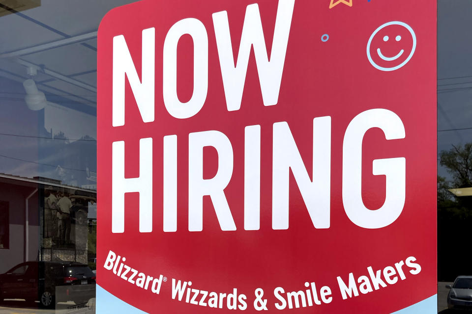 File - A hiring sign is displayed at a fast food restaurant in Northbrook, Ill., on May 22, 2023. Although the Federal Reserve has sharply raised interest rates, the unemployment rate is near a half-century low. (AP Photo/Nam Y. Huh, File)