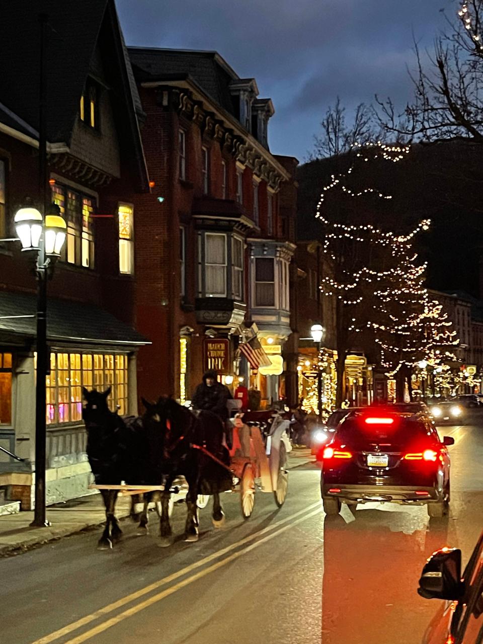 A horse and buggy is seen on Broadway in Jim Thorpe during Christmastime. The horse carriage rides will resume during Winter Fest Feb. 19 - 20 in the quaint town.