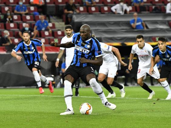 Romelu Lukaku won and scored an early penalty against Sevilla for his 34th goal of the season (Getty Images)