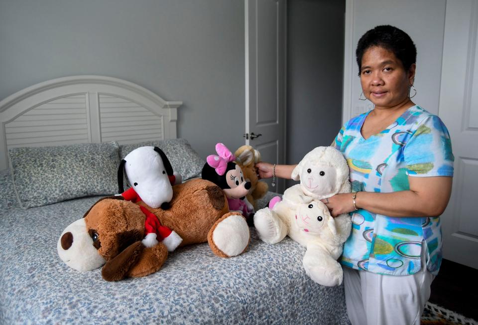 Nisarat "Nungning" Jittasonthi shows some of her favorite stuff animals in her room, Tuesday, Nov. 14, 2023, at her Vero Beach home she shares with her mother Supee Spindler.