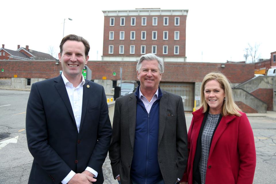 Portsmouth Mayor Deaglan McEachern, left, Michael Kane, CEO of The Kane Company, and City Manager Karen Conard prepare to move forward on the McIntyre federal building redevelopment project on Wednesday, April 6, 2022.