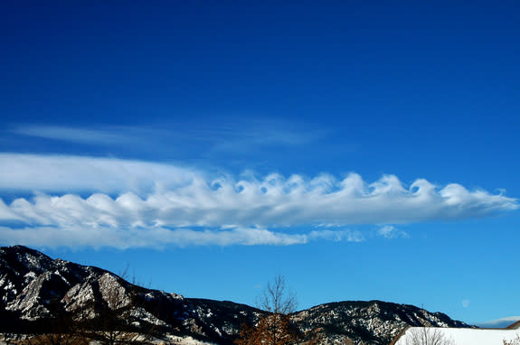 Kelvin-Helmholtz clouds over mountains.