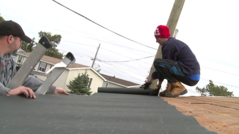 Neighbours help fix Summerside woman's damaged roof