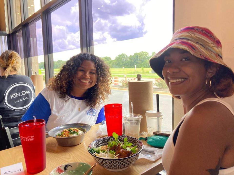 A.J. Hill, left, and her sister, Janell Holloway, try ZAAP Thai Street Food in Warner Robins for the first time.