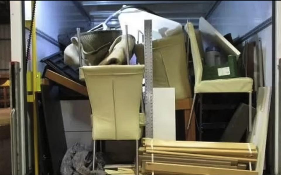 Furniture piled up inside one of the vans - WMPS