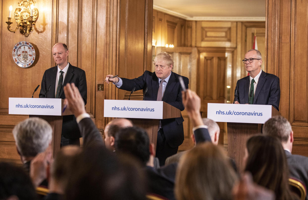 Chief Medical Officer for England Chris Whitty (left) and Chief Scientific Adviser Sir Patrick Vallance stand with Prime Minister Boris Johnson during a media briefing in Downing Street, London, on Coronavirus (COVID-19) after the government�s COBRA meeting. Picture date: Monday March 16, 2020. See PA story HEALTH Coronavirus. Photo credit should read: Richard Pohle/The Times /PA Wire